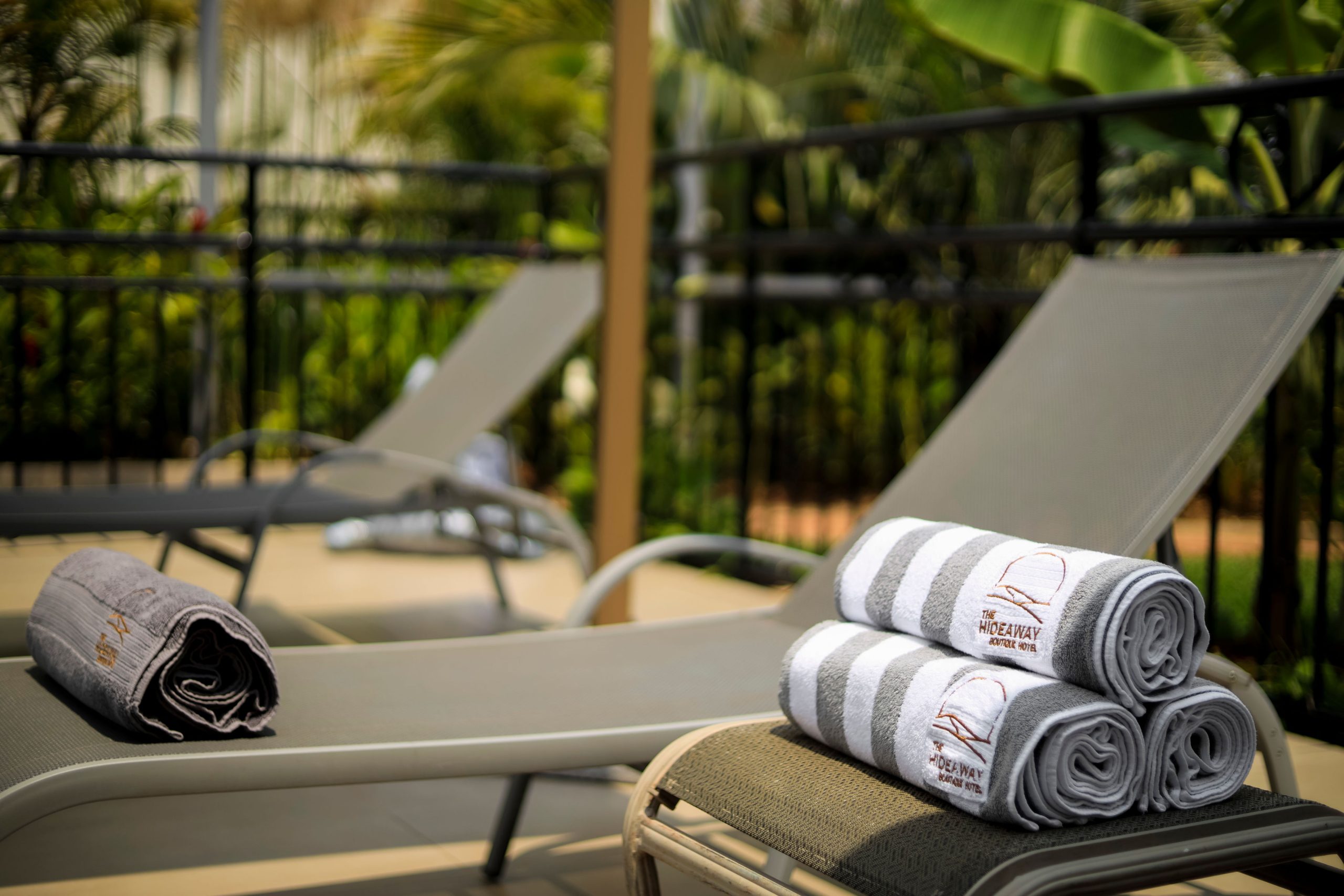 Pool loungers with fresh towels